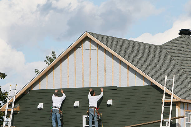 Professional Siding technician working in Windsor, SC